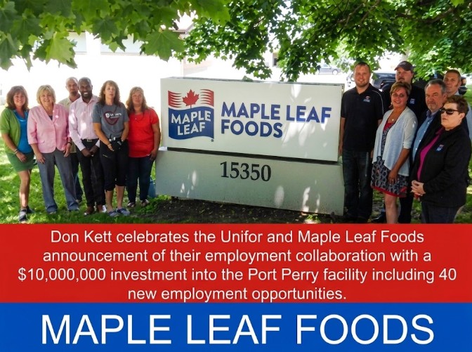 Don Kett with Unifor and Maple Leaf Foods representatives at the Scugog Island facility sign, marking the announcement of a $10 million investment and 40 new jobs